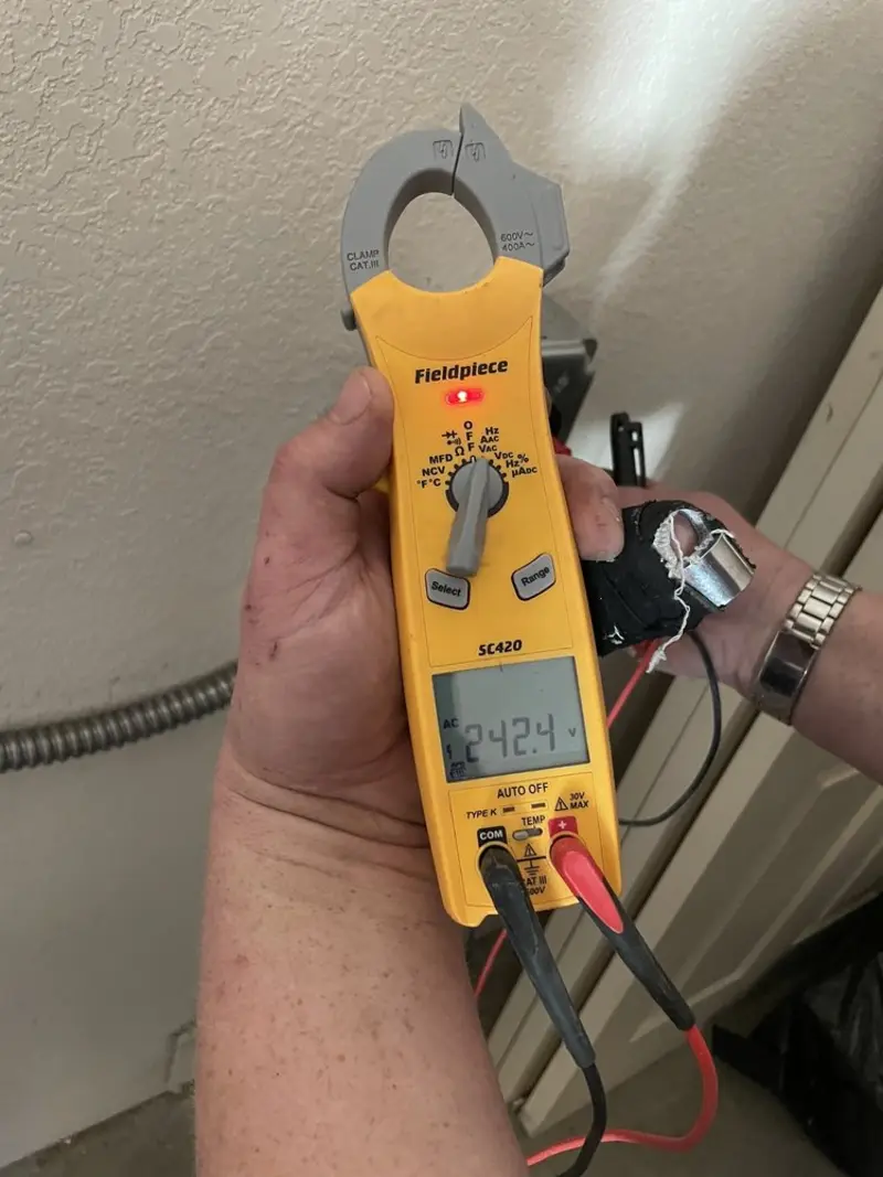 Voltage testing with clamp meter during Electrical Installation Services in Pinetop-Lakeside